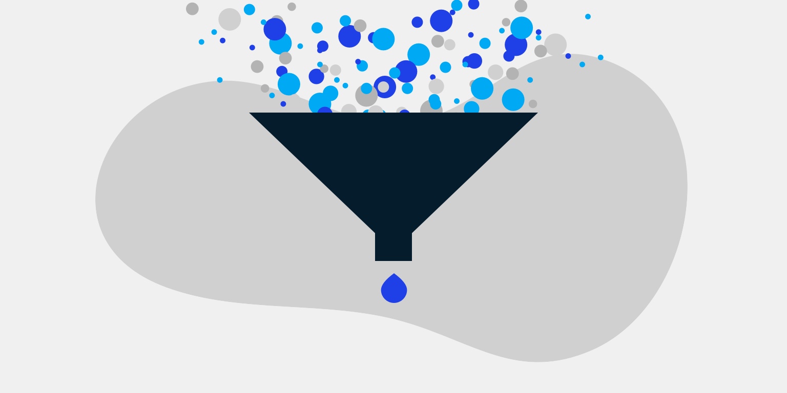 Multicolored balls going into a funnel and one single ball coming out