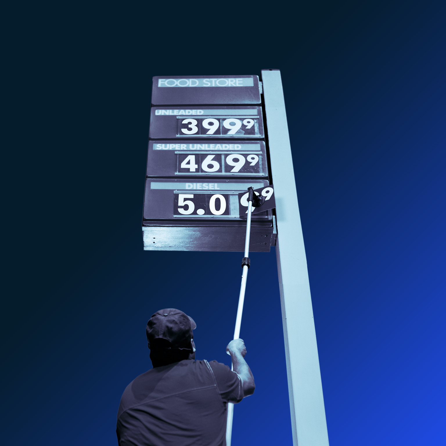 Man putting up price sign at station