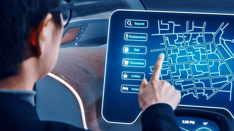 Stylish Businessman Setting Location on an Interactive Navigation App